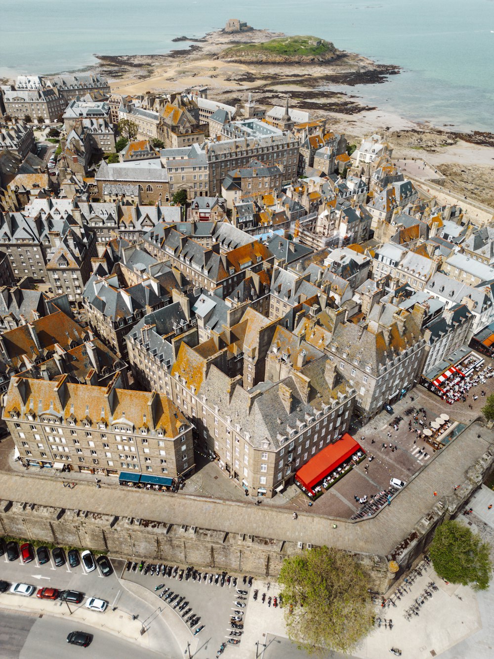 an aerial view of a city with a lot of buildings