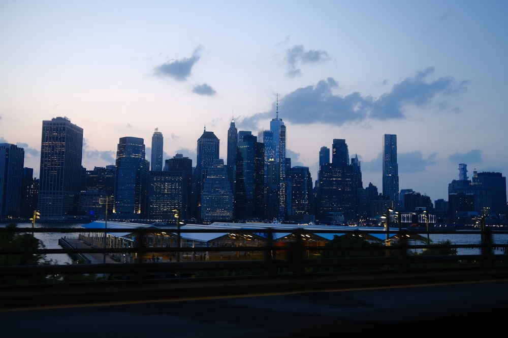 a view of a city skyline at dusk