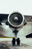 Close-up of a Boeing aircraft engine part with detailed metal components.