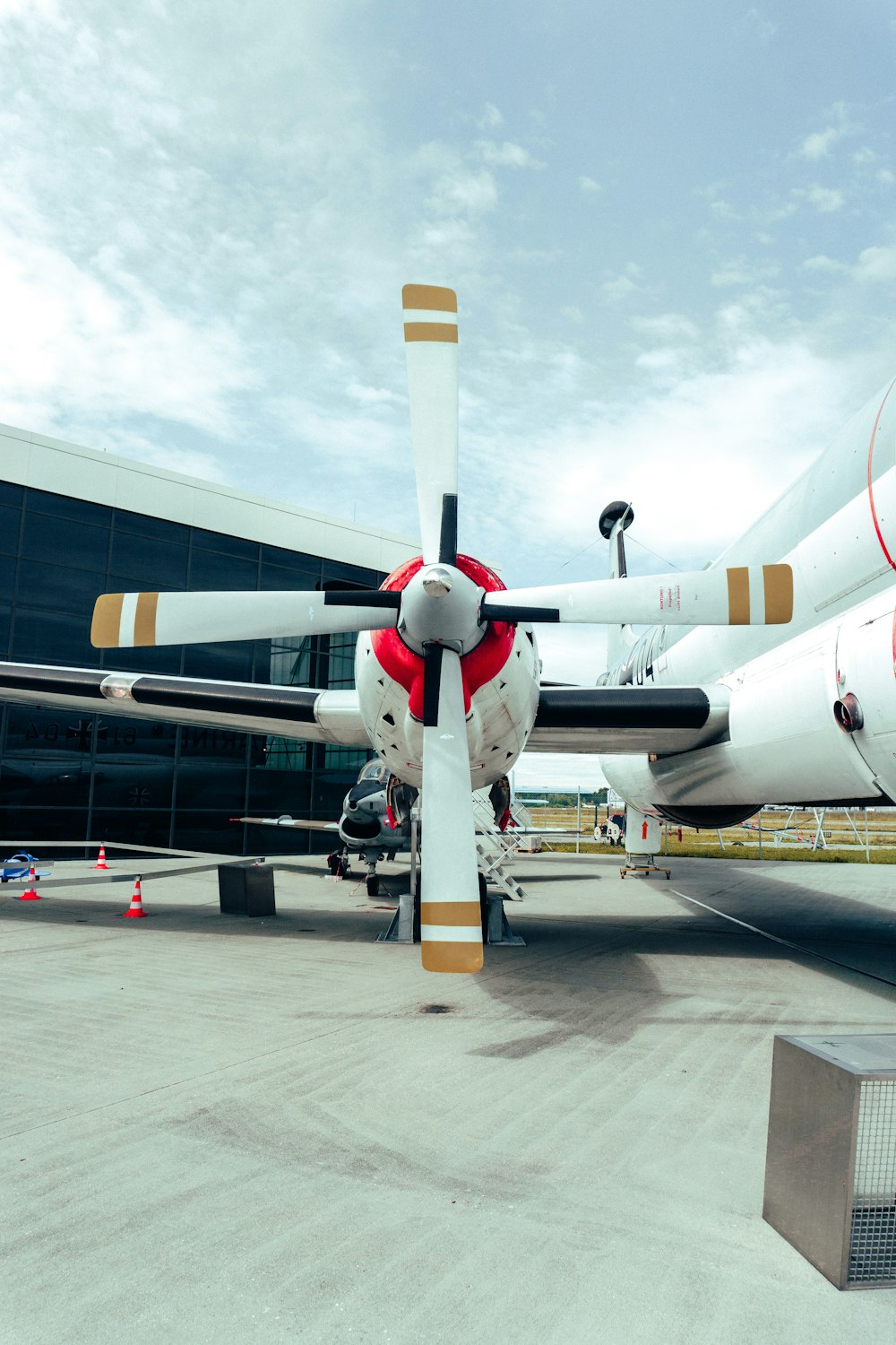 a large jetliner sitting on top of an airport tarmac