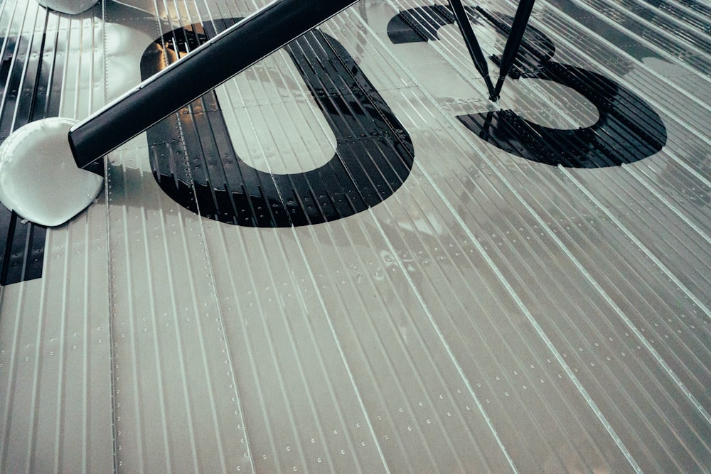 a black and white clock on the side of a building