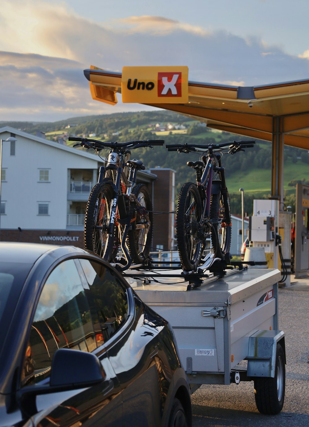 a truck with two bikes on the back of it