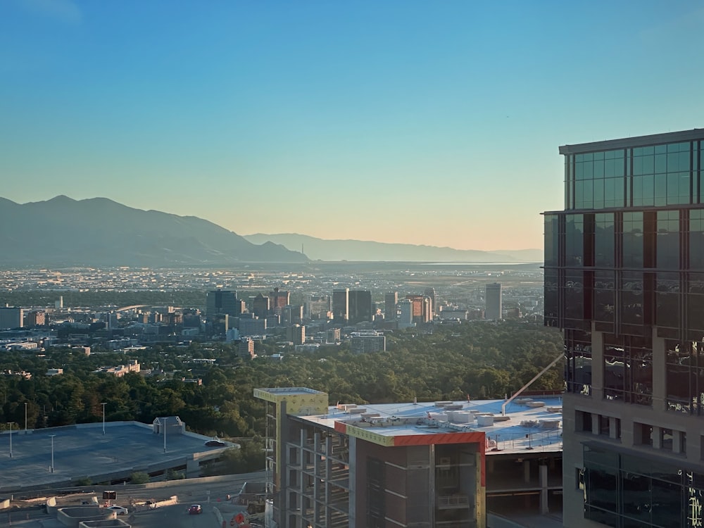 a view of a city with mountains in the background