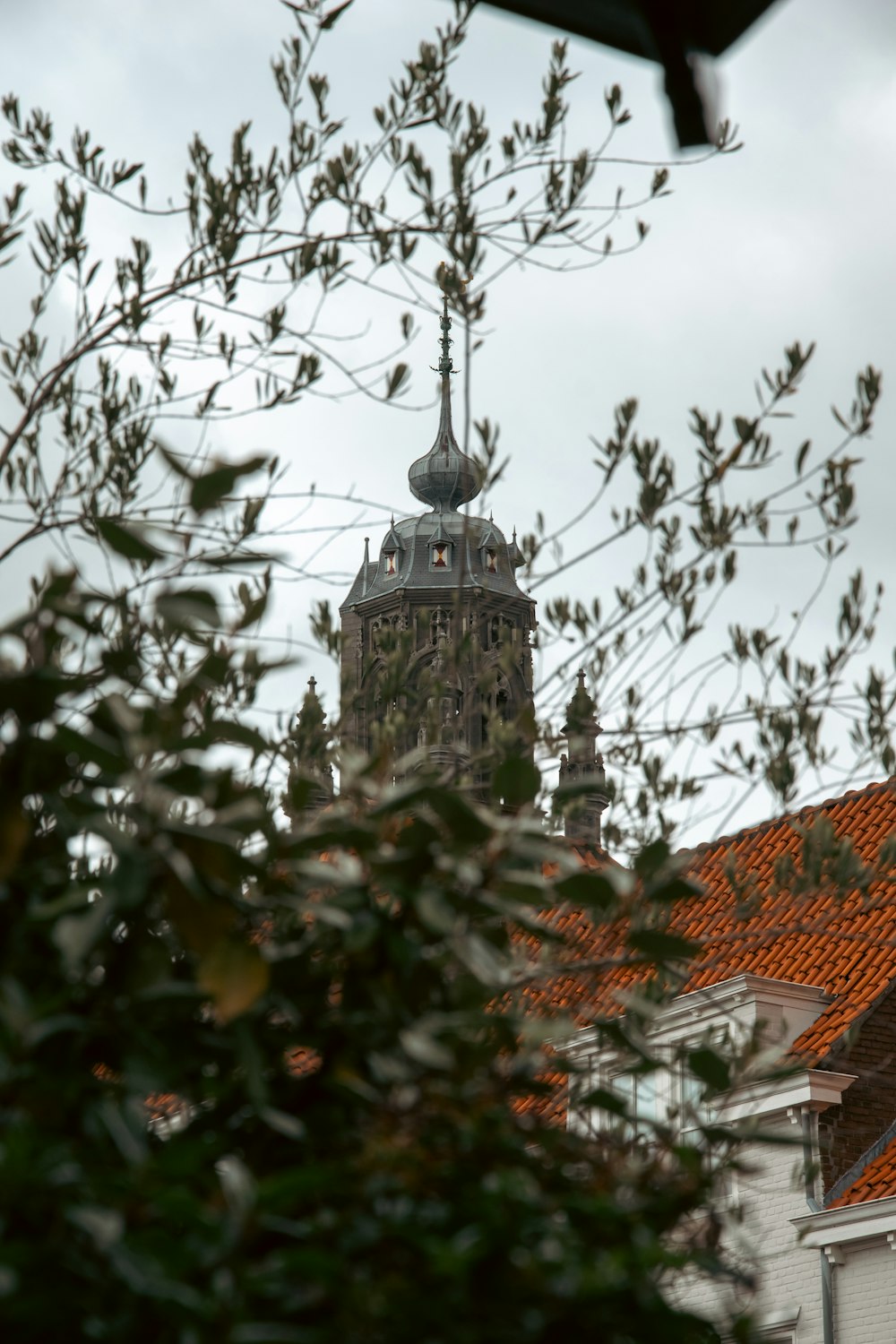 a tall building with a clock on the top of it