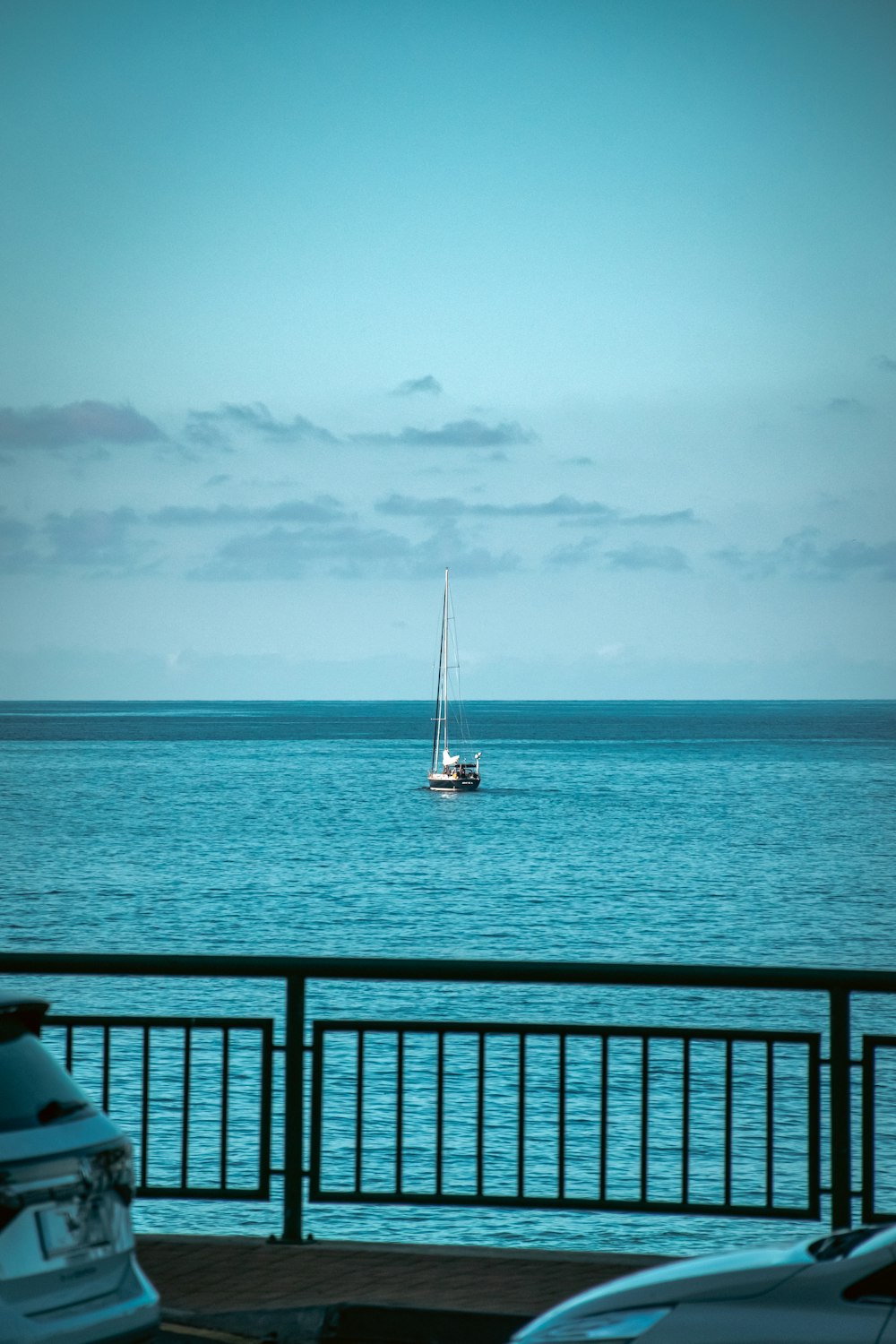 a boat is out in the ocean on a sunny day