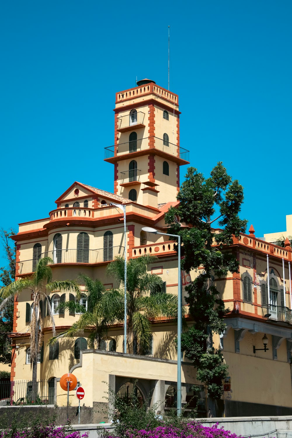 a tall building with a clock on the top of it