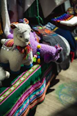 Close-up of a colorful fabric llama doll inspired by Argentine Patagonia