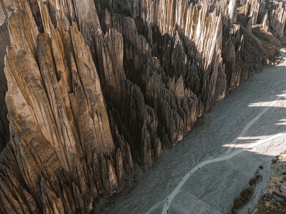 an aerial view of a mountain with a river running through it