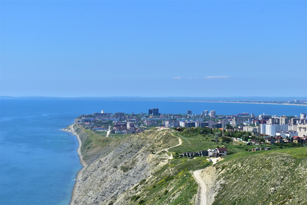 a scenic view of a city on the edge of a cliff