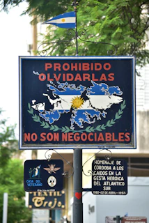 a sign that is on the side of a pole