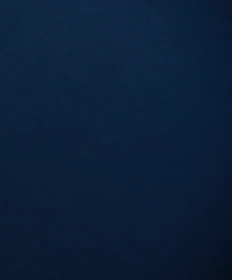 A serene, midnight navy backdrop highlighting subtle textures and sophisticated materials.