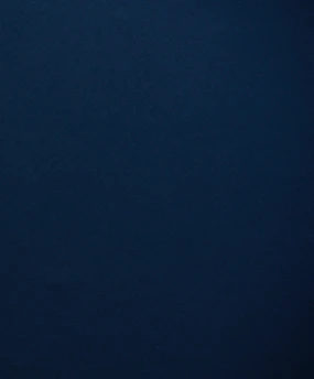 A compact board in deep ocean blue with subtle texture.