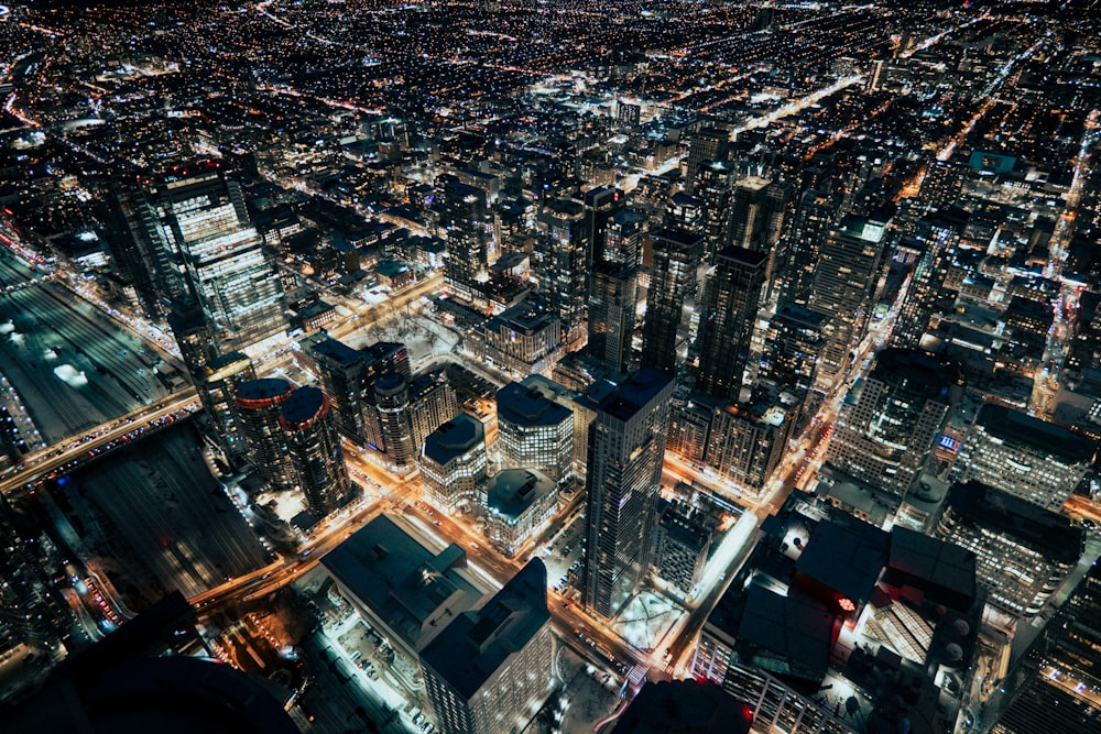 an aerial view of a city at night