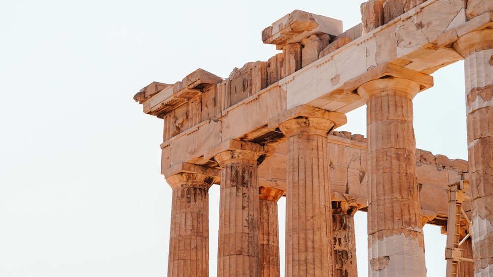 a close up of a building with many columns