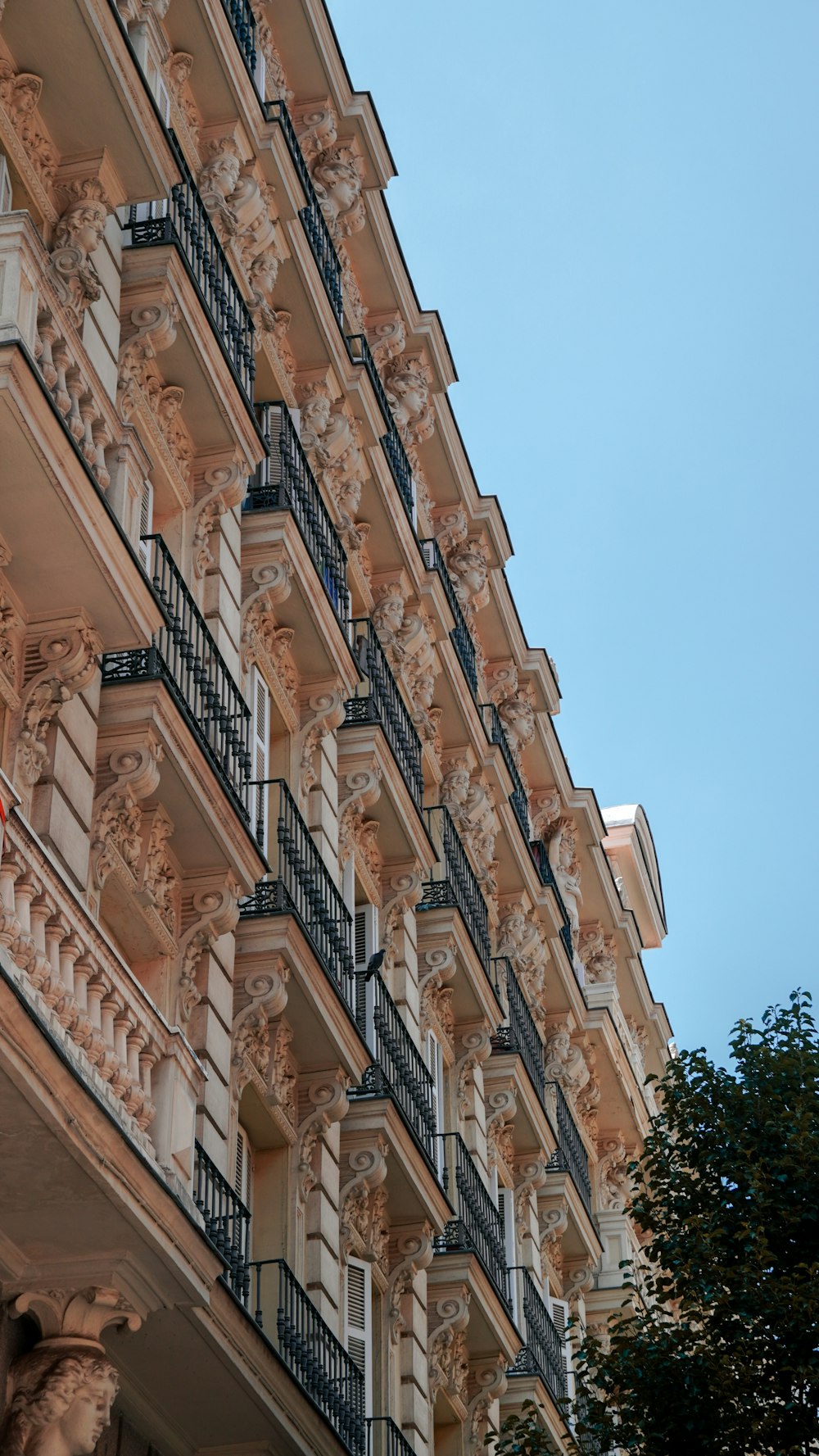 a tall building with balconies and balconies on it