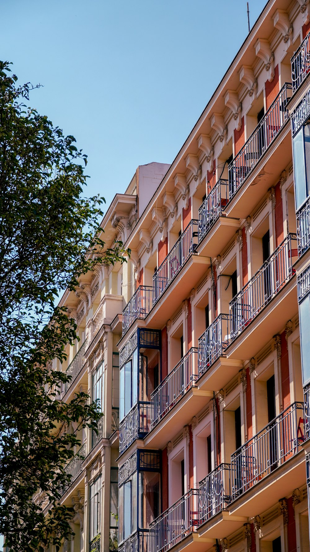 a tall building with balconies and balconies on the balconies