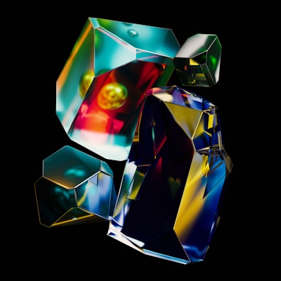 Artistic display of multi-color lights reflecting off glass surfaces in a minimalist space