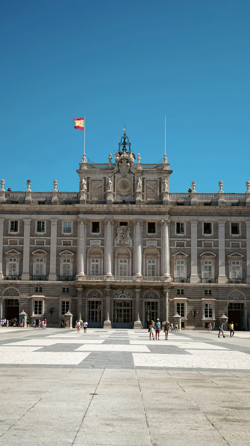 a large building with a flag on top of it