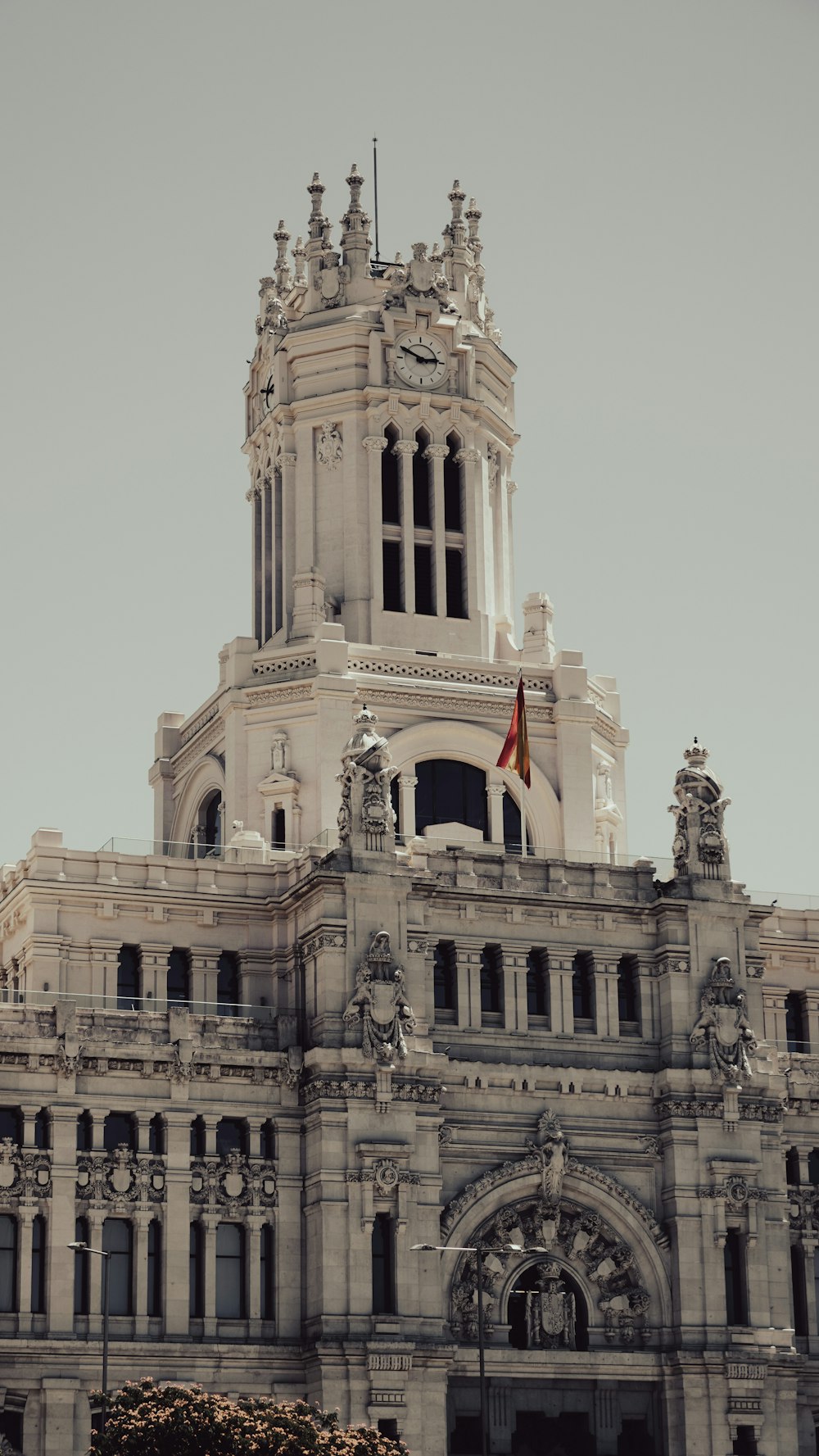 a tall building with a clock on the top of it