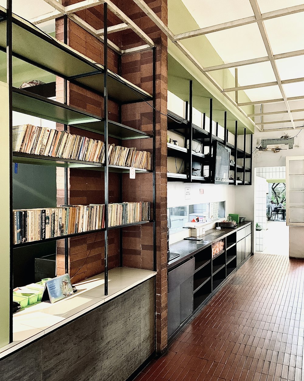 a room filled with lots of shelves filled with books