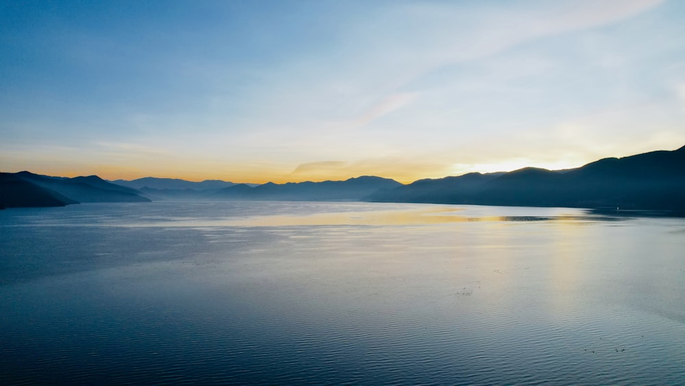 a large body of water surrounded by mountains