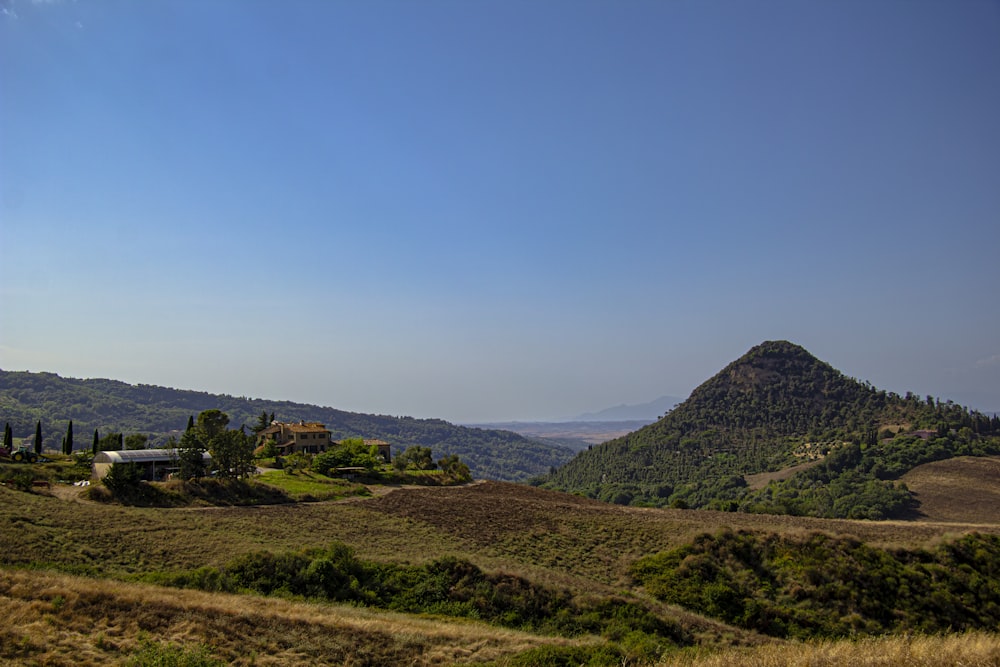 a hill with a house on top of it