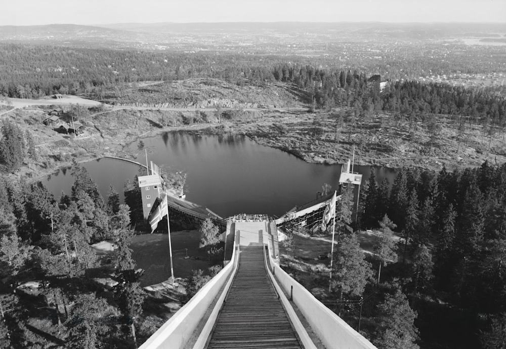 an aerial view of a bridge over a body of water