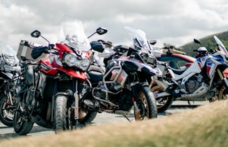 a group of motorcycles parked next to each other