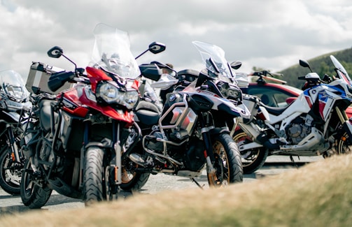 a group of motorcycles parked next to each other