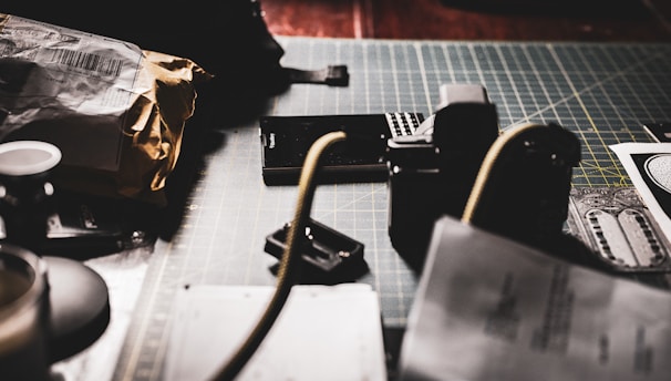 A modern workspace featuring packaging materials and tools.
