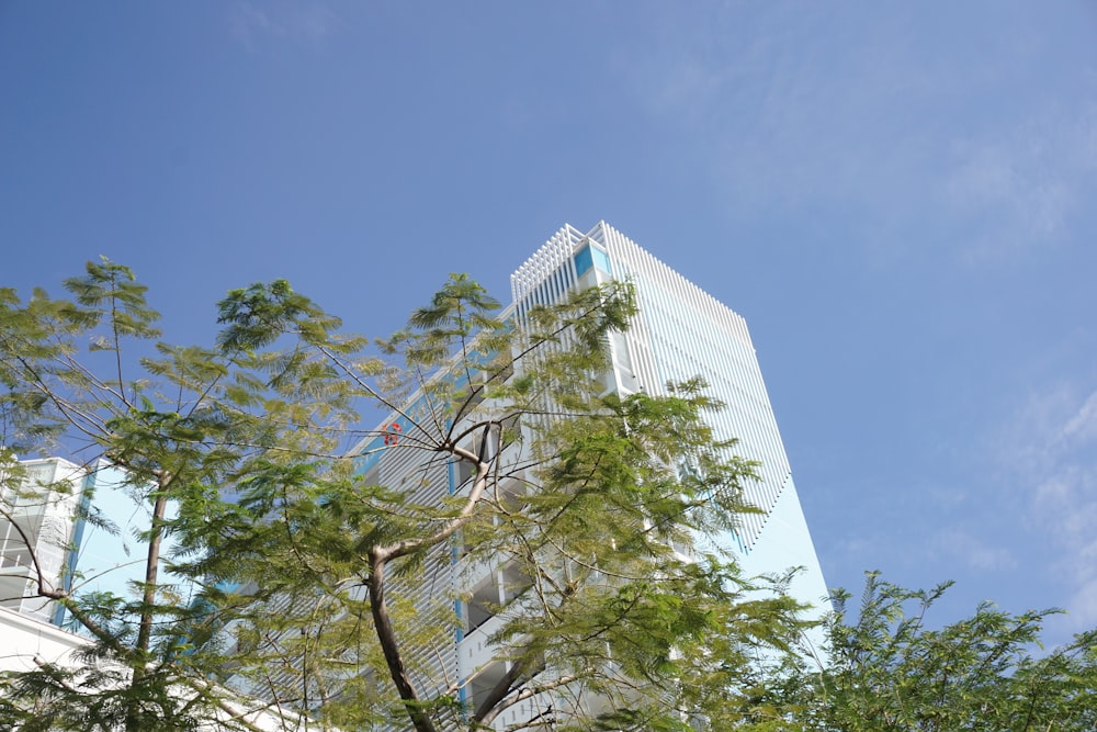 a tall building with a clock on the side of it