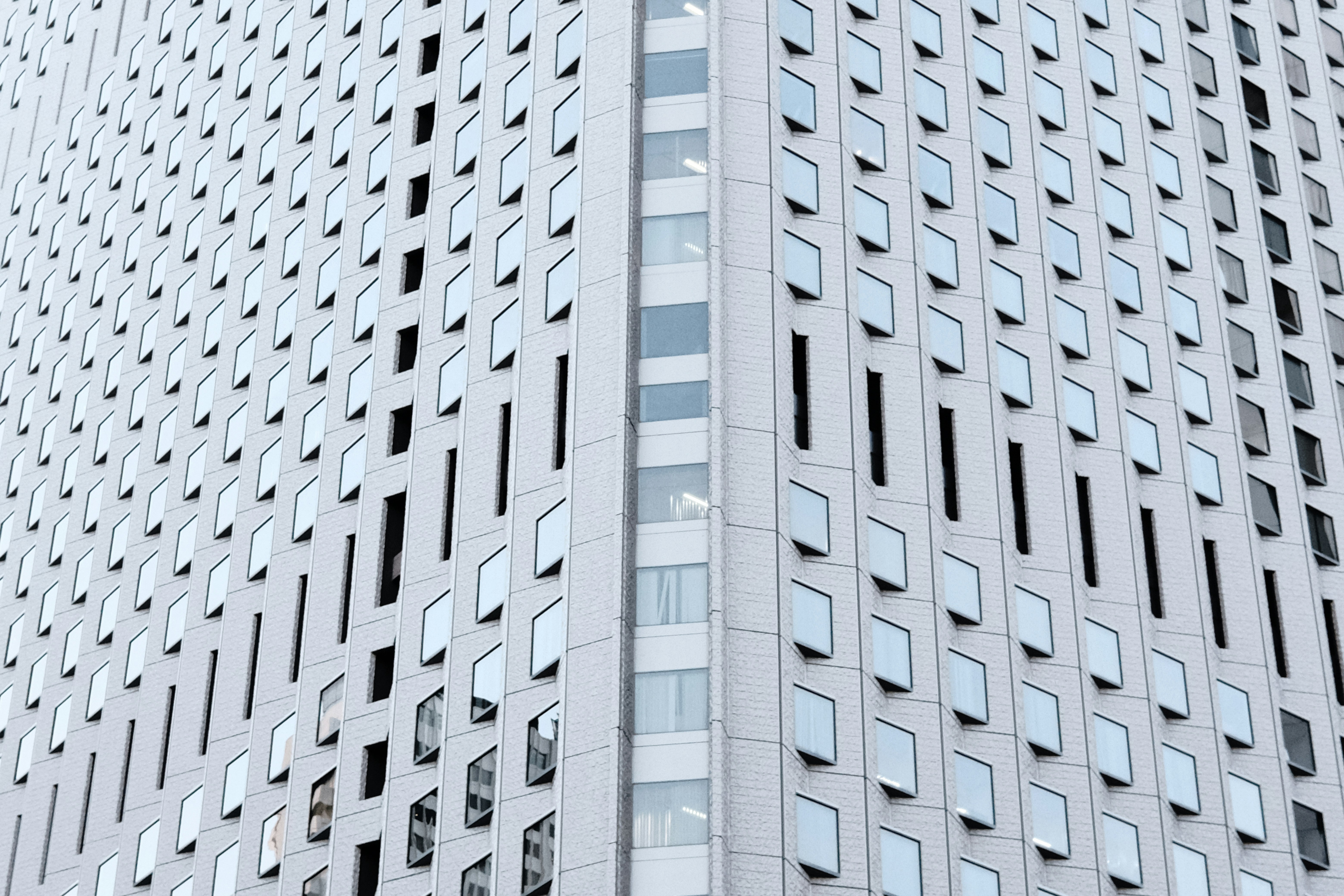 a very tall building with many windows on it