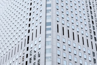 Wide shot of a completed façade system on a downtown commercial tower.