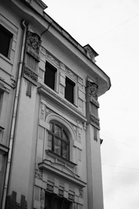 Detailed monochrome drawing of a historic building facade.