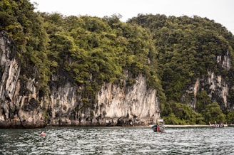 Tranquil limestone cliffs rising from turquoise waters at Phi Phi islands
