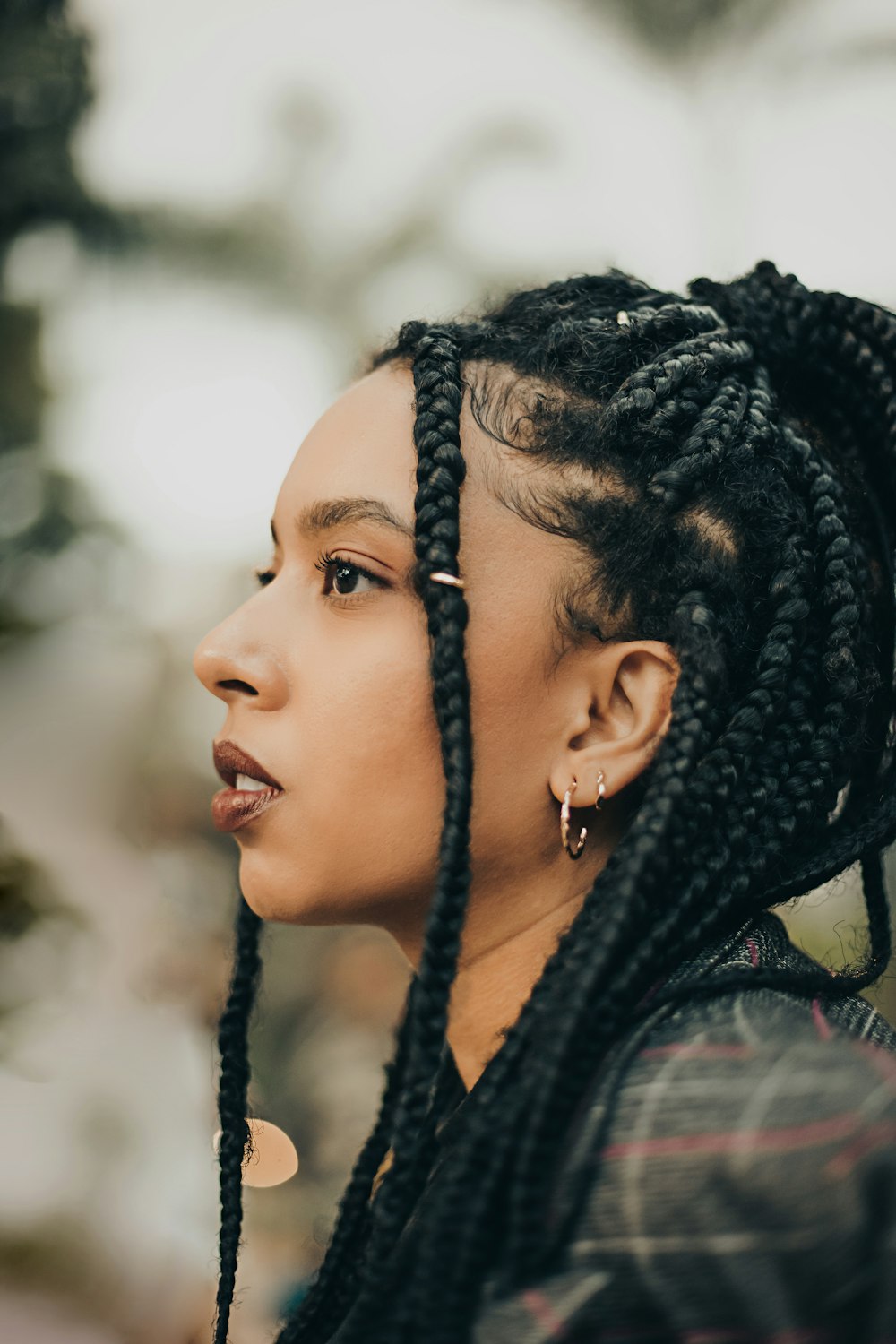 a close up of a person with dreadlocks