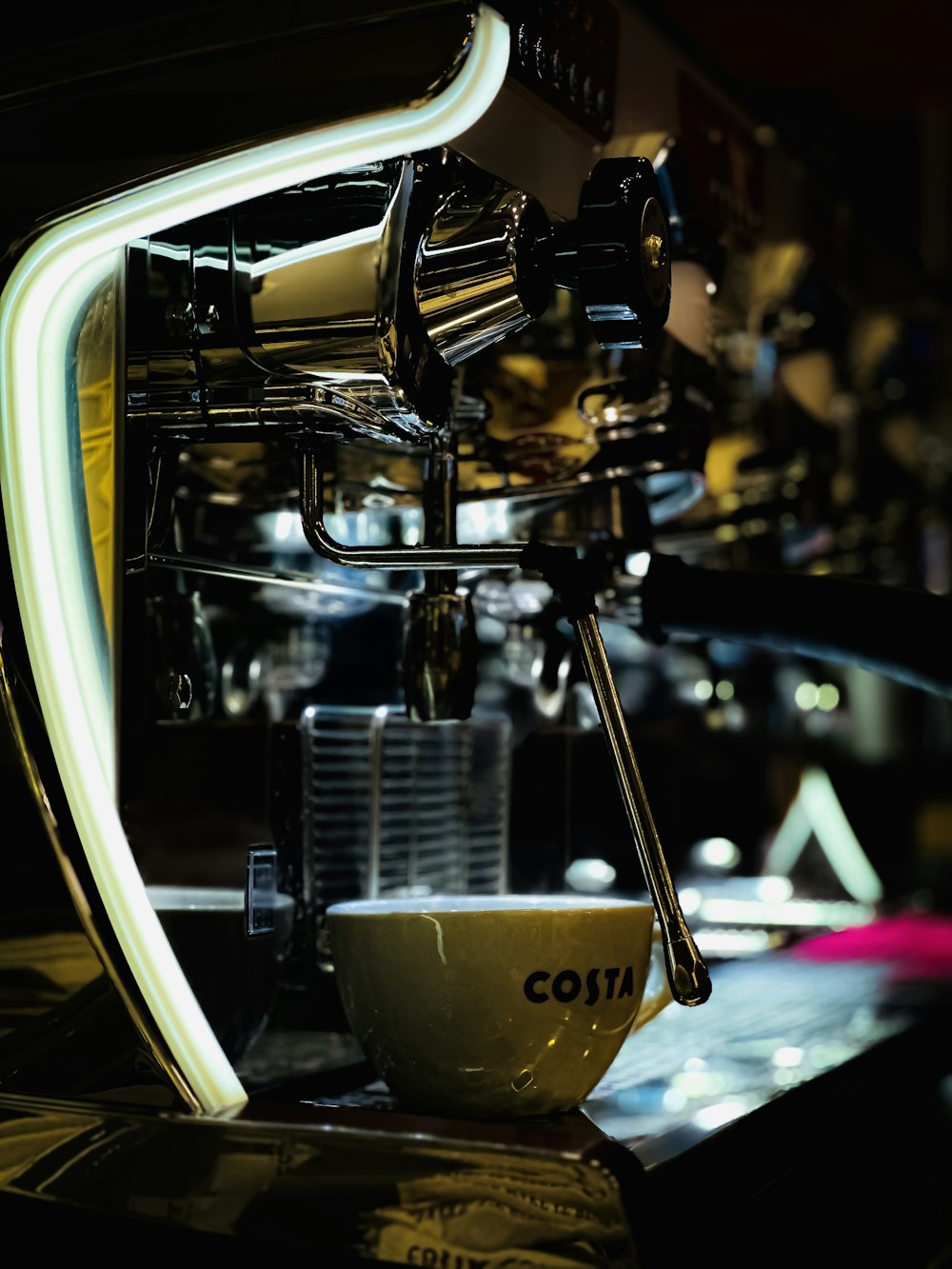 a coffee machine sitting on top of a counter