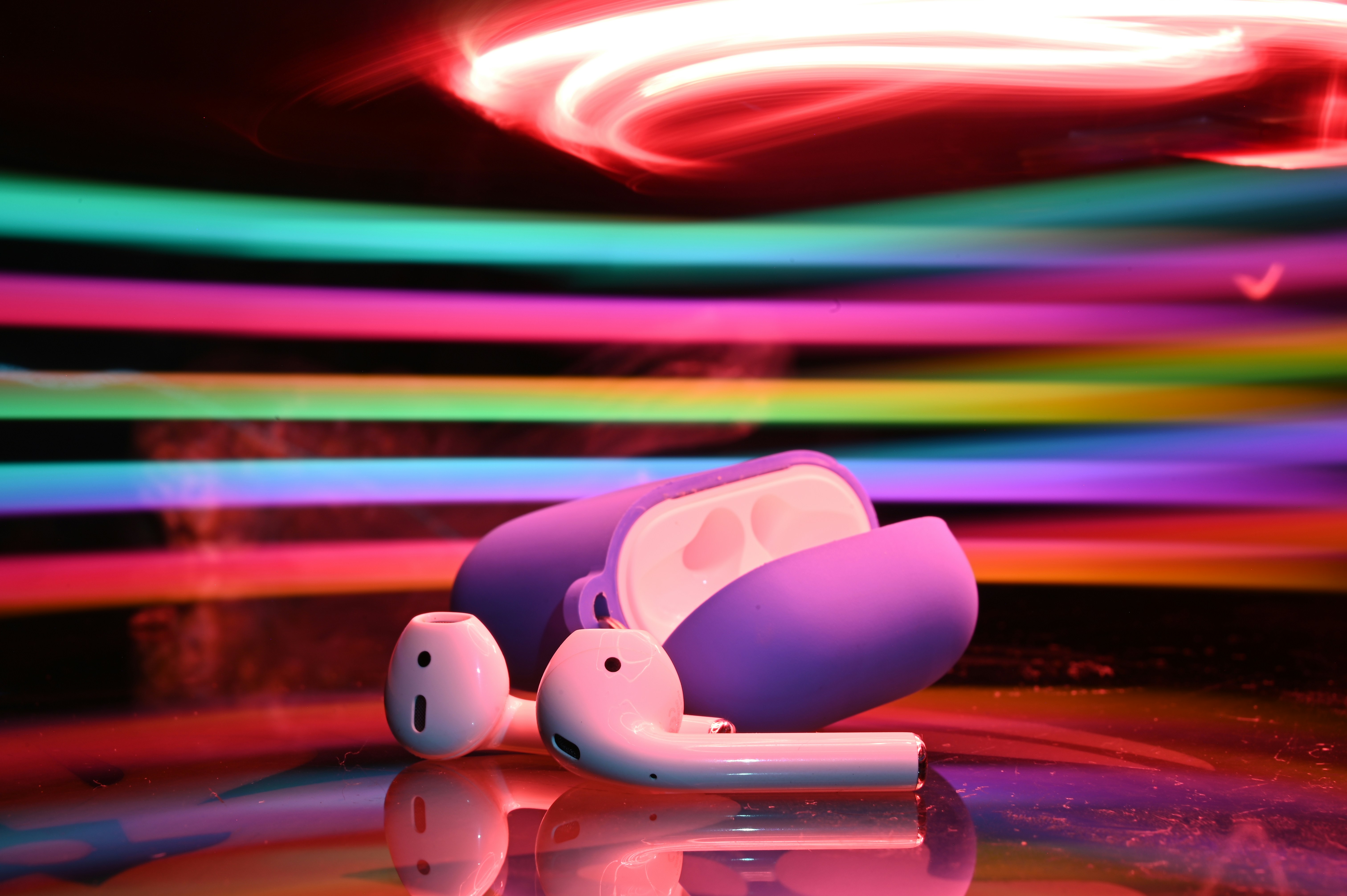 a pair of headphones sitting on top of a table