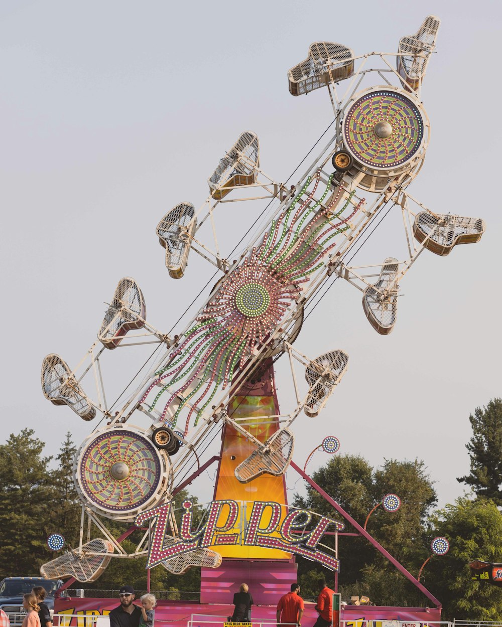 a large ferris wheel in a carnival park