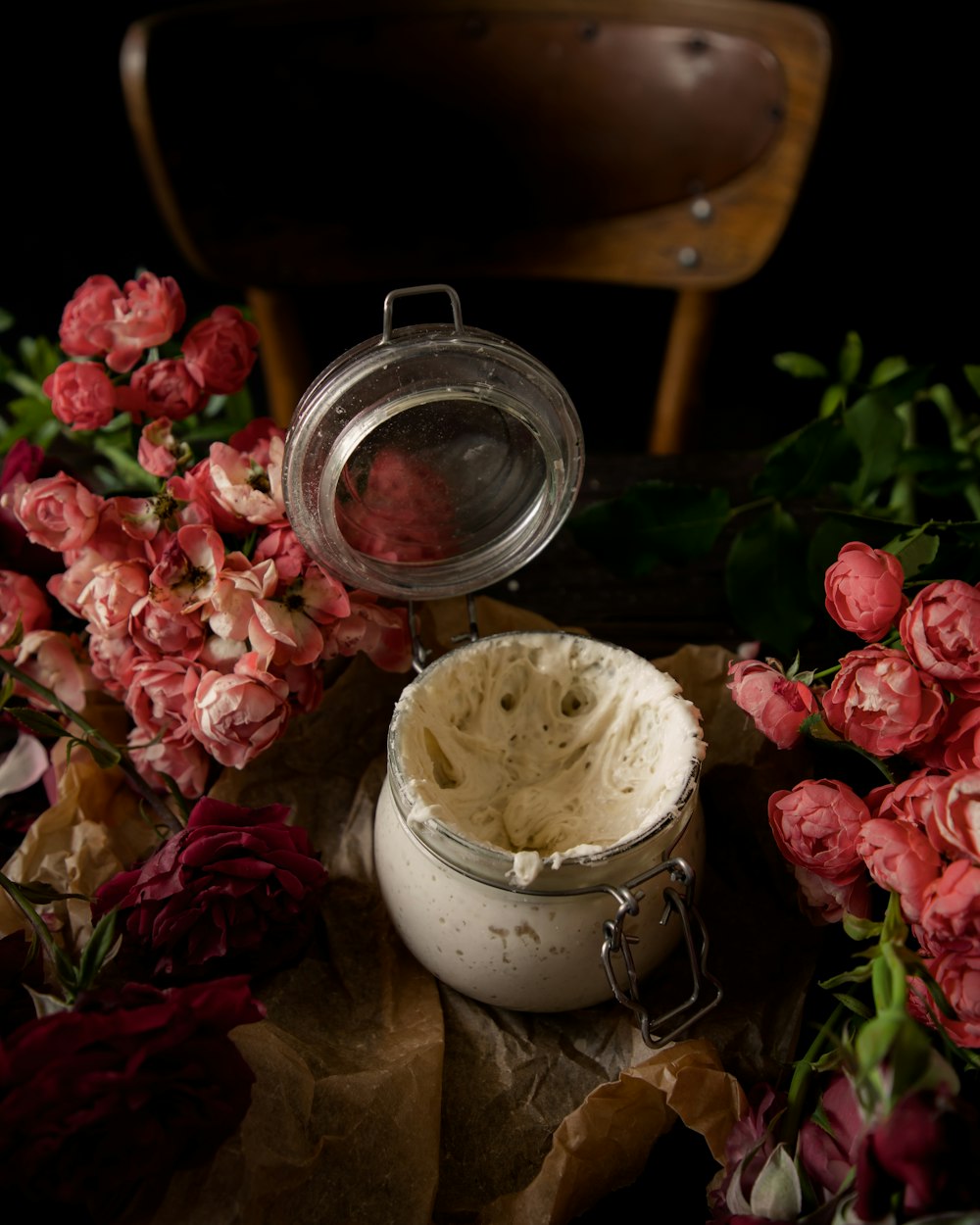 a table topped with lots of pink flowers