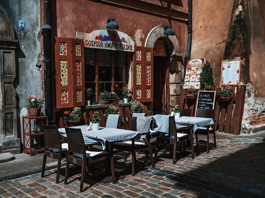 a table and chairs outside of a restaurant,