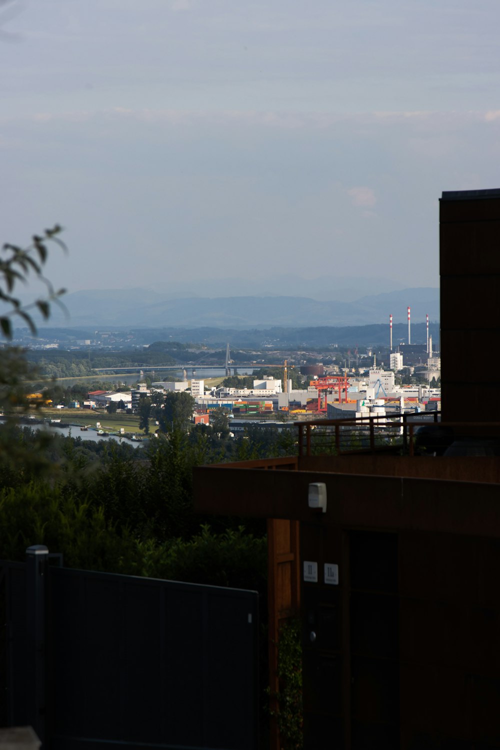 a view of a city with mountains in the distance