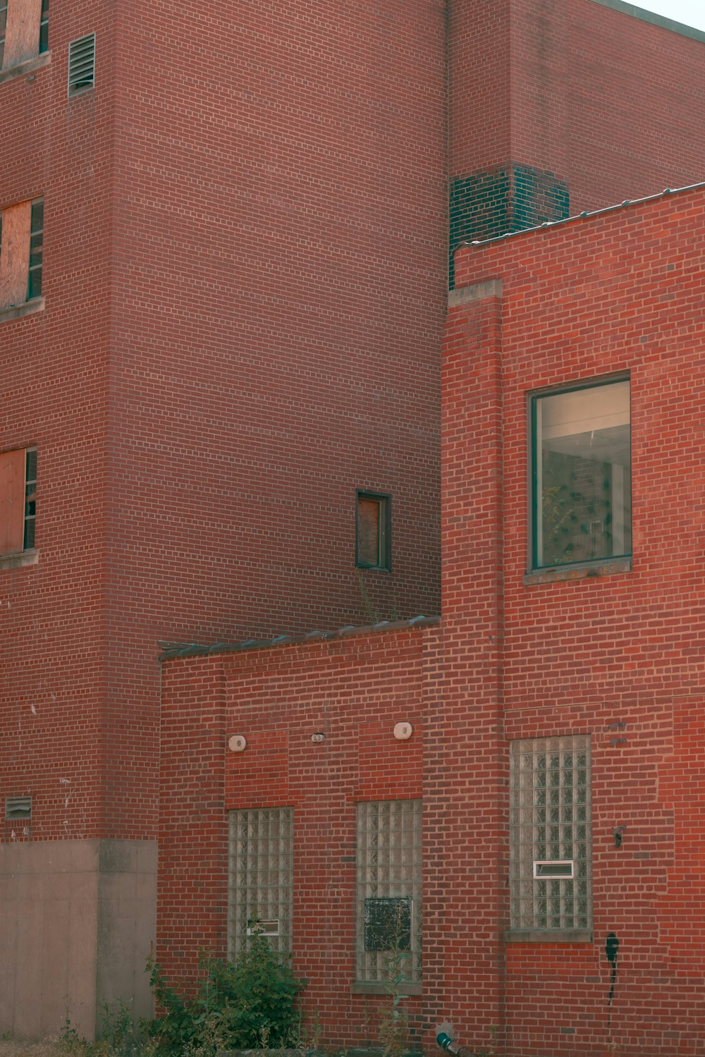 a red brick building with a clock tower