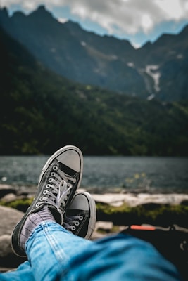A man wearing versatile footwear while enjoying a casual outdoor activity.