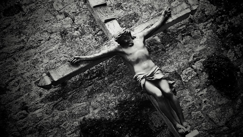 a black and white photo of a crucifix