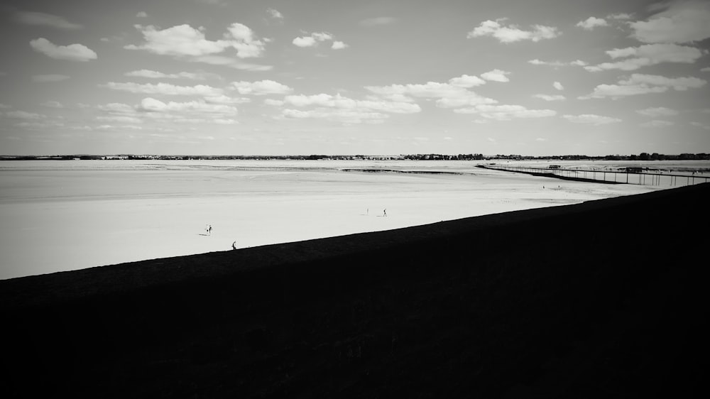 a black and white photo of a body of water