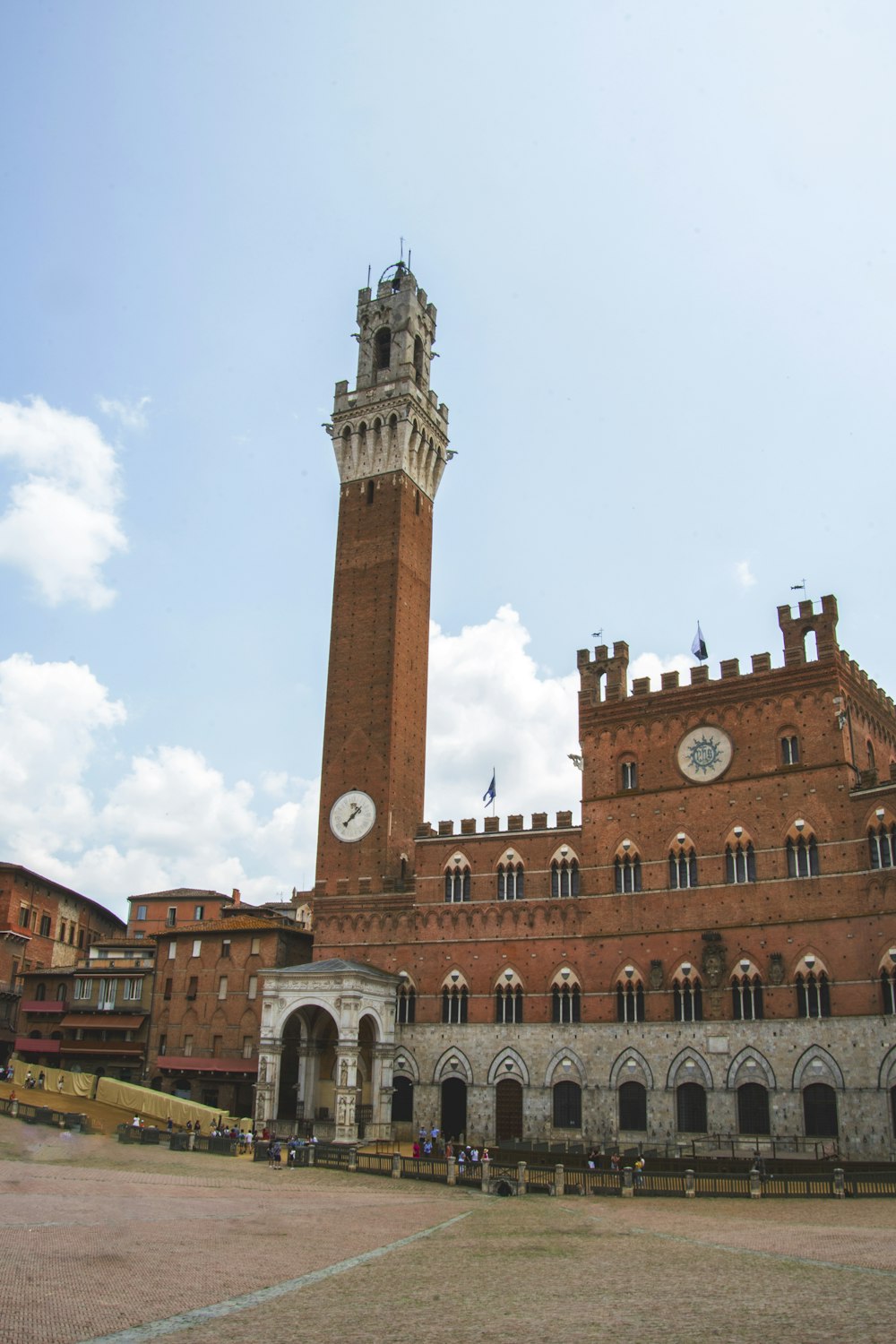 a large brick building with a clock tower