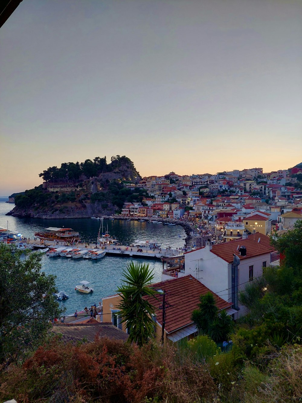 a view of a harbor with boats in the water