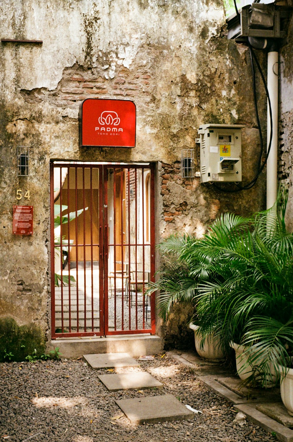 a building with a red sign on the front of it