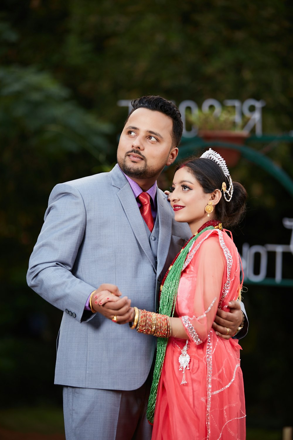 a man and a woman standing next to each other